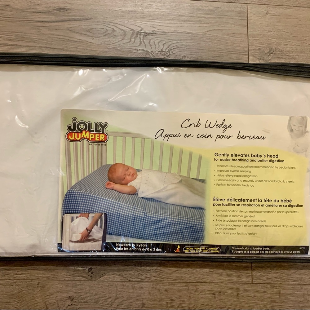 Jolly Jumper crib wedge